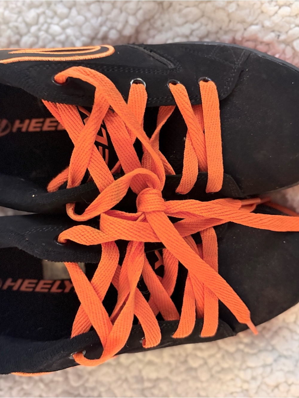 Heelys children’s Black Skate Sneakers with Orange Laces